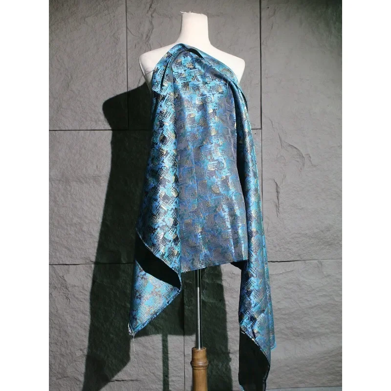 Blauer metallischer Glanz Graffiti Jacquard Stoff Muster Qipao Fotohintergrund Stoff Kleidung Designer Kreativer Stoff