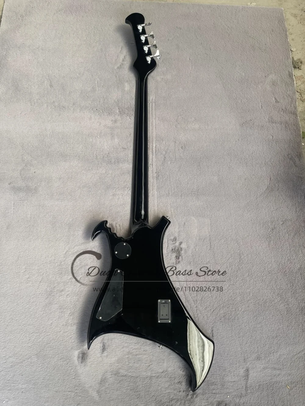 Classic 4 strings black bass guitar, single fixed bridge, 4 pickups, Roman numeral inlaid fretboard, solid wood body, maple neck