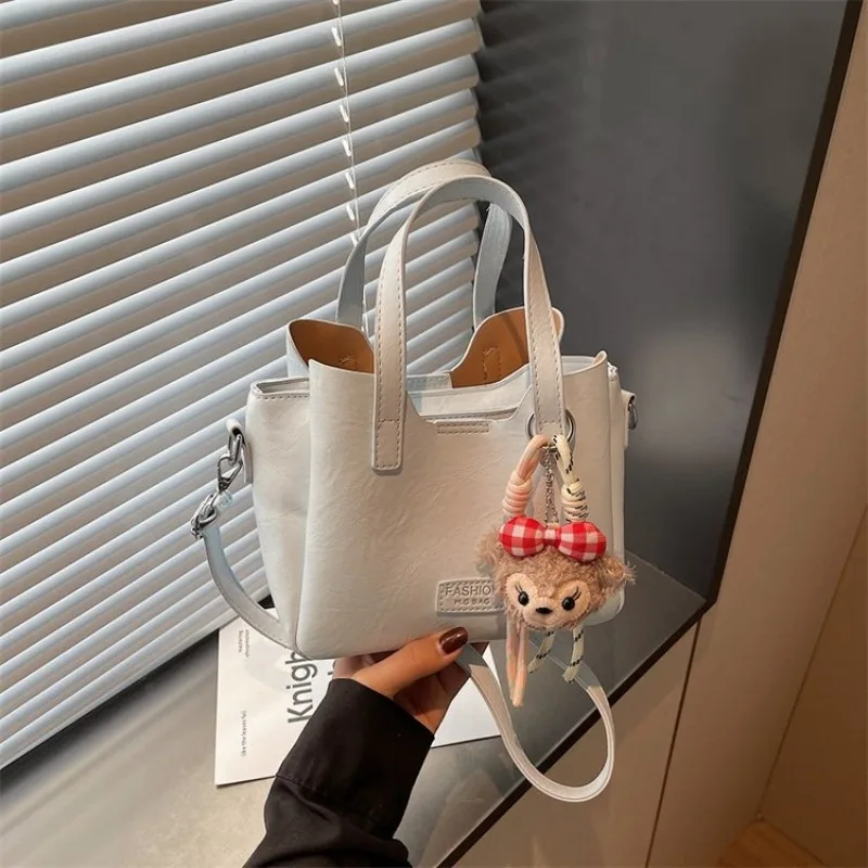 

Minimalist Fashion Handbag Ladies Trendy Designer Cutting Luxury Leather Material Daily Commute Bag