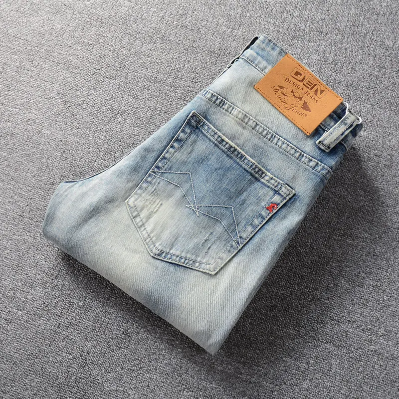 Jeans rasgado de ajuste fino elástico azul claro masculino, moda de rua alta, designer de bordados, calça jeans vintage