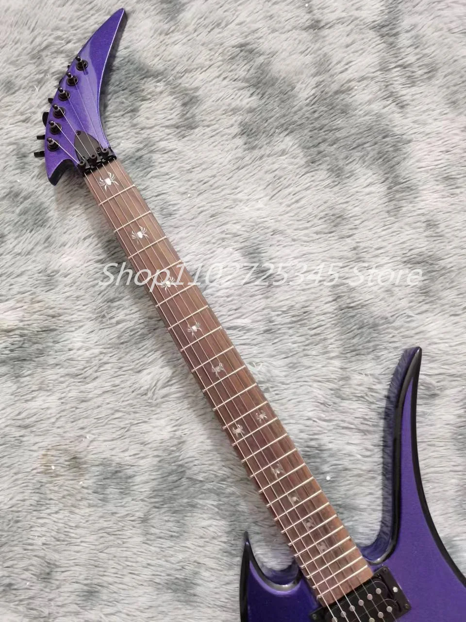 6-string skull electric guitar, metal purple paint, rosewood fingerboard, black accessories, tremolo system, shipping cost to be