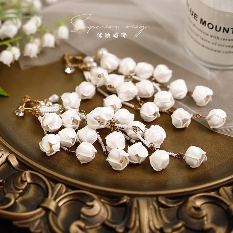Korean gentle senior sense exquisite Lily of the valley bud handmade white tassel extra long flower earring bridal accessories