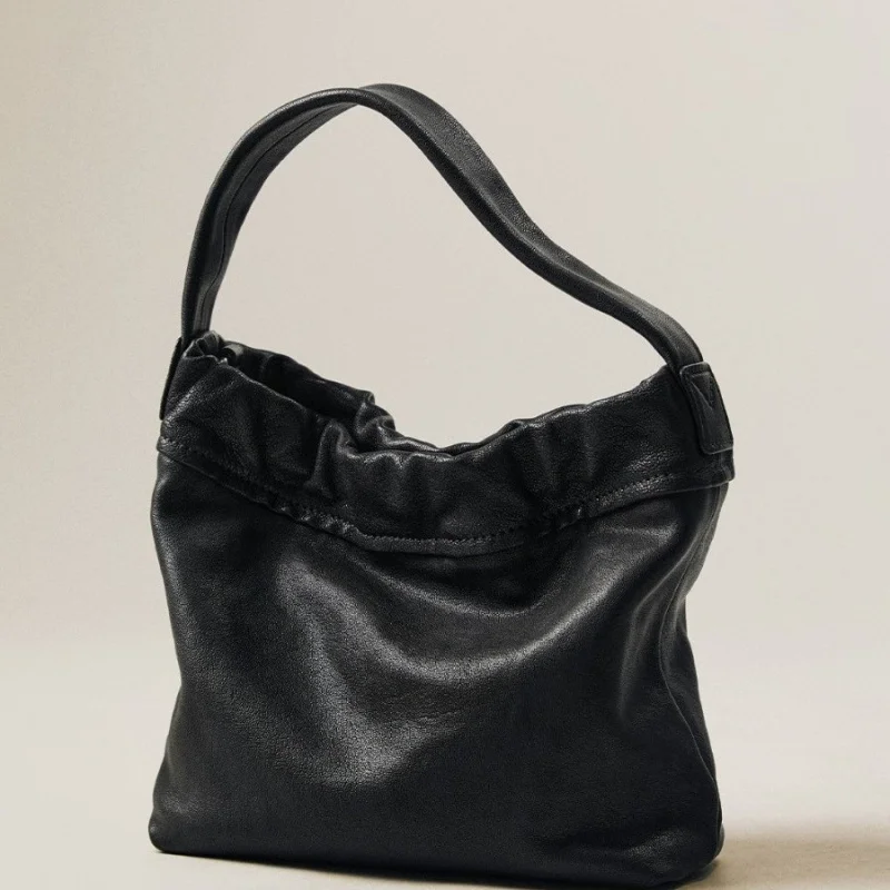 Cloud-shaped handbag made of sheepskin, casual and versatile, suitable for carrying by hand, shoulder, or crossbody for women