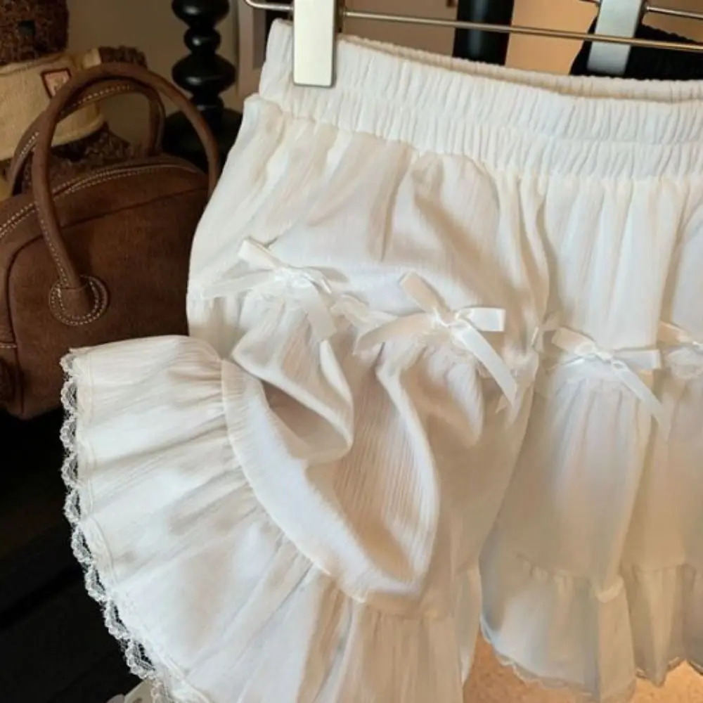 

Мини-юбка с высокой талией для девочек, с защитными шортами, свободная, с бантом, А-силуэт, с оборками, кружевная, плиссированная