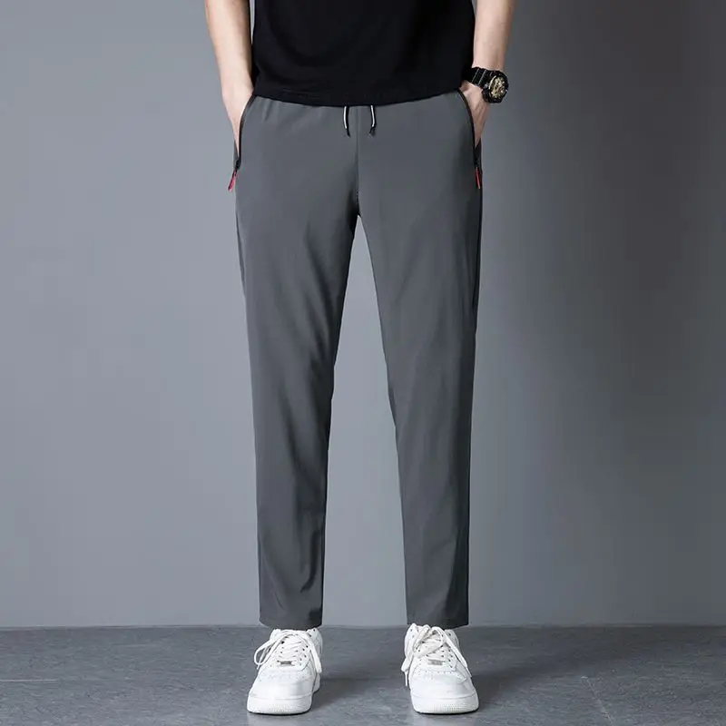 Men's casual pants straight leg slim fit elastic waist jogging pants Korean classic blue black gray men's pants plus size 4XL5XL