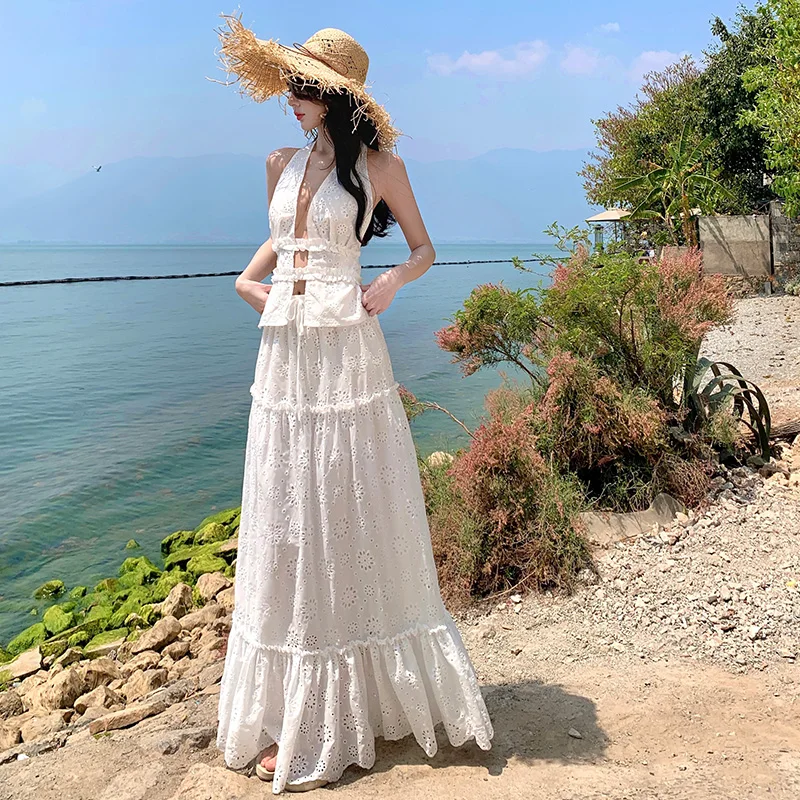 

Bohemian New Summer Holiday 2 Piece Set For Women Sexy V Neck Blackless Sleeveless Crop Tops + Hollow Out Long Skirt Suits