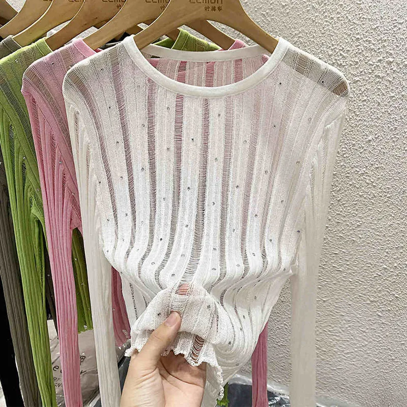 ニットセーター女性プルオーバー新しい長袖 O ネック中空ニットセータープルオーバー女性トップスセーター女性服 Q1267