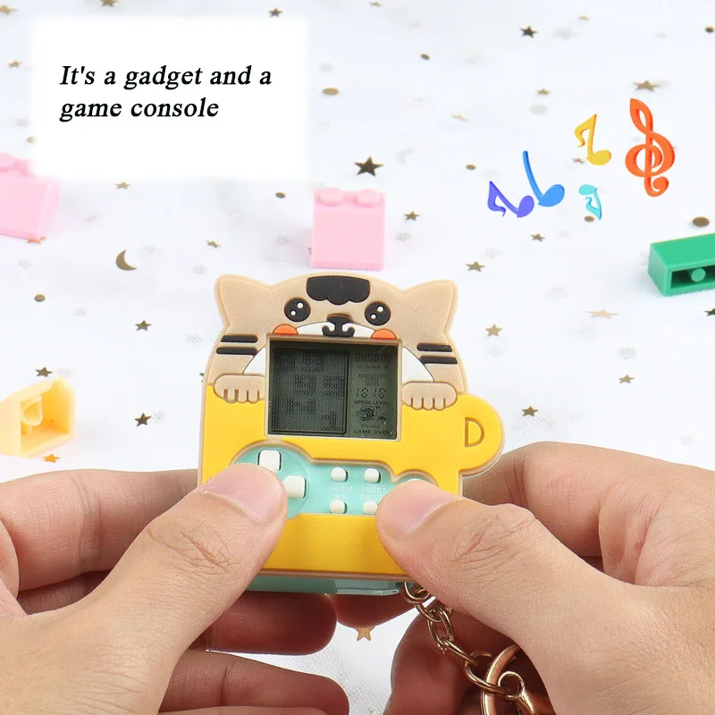 Mini Handheld Game Console Plastic Portable Creative Puzzle Machine with Multiple Games Soft Kitten Backpack Keychain