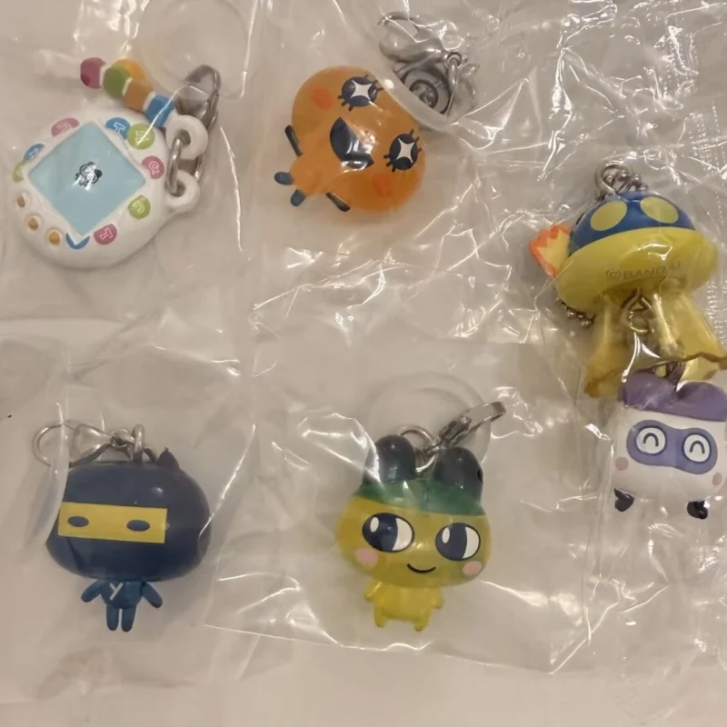 

Новинка в наличии: Оригинальные брелоки-талисманы Bandai Tamagotchi, серия 3, Гашапон, милые брелоки-подвески, коллекционные игрушки, подарок