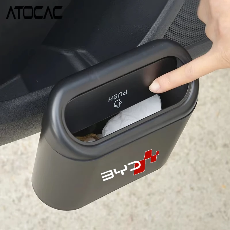 A car trash and miscellaneous bin with BYD pattern printed on it, stylish design, durable material, keeping the car clean, beaut