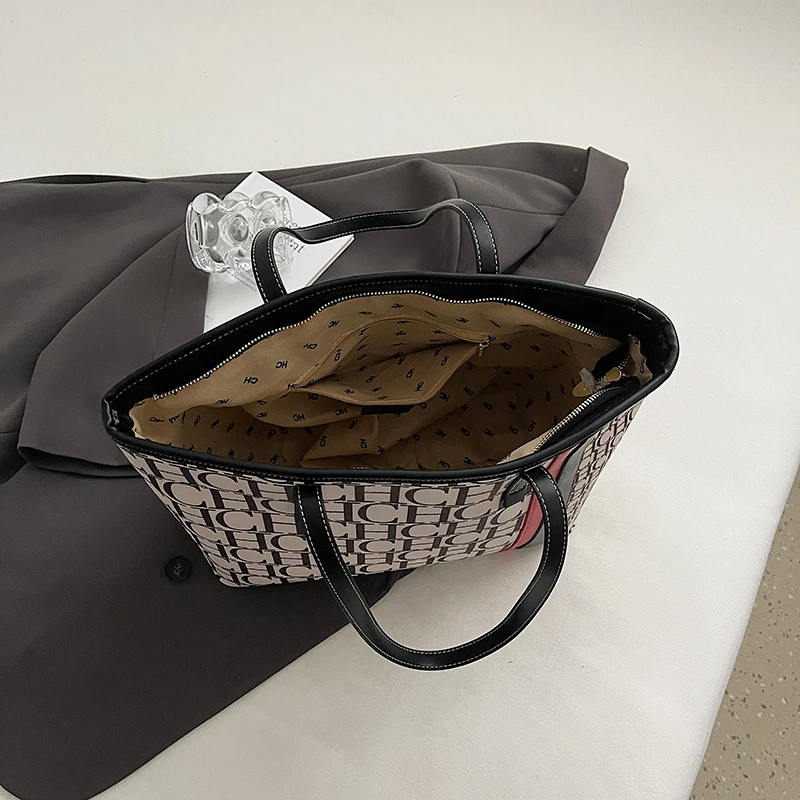 Luxury women's zipper shoulder bag, fashionable classic large capacity shopping bag, creating a daily exquisite style