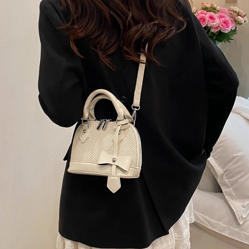 

2025 New High-end Ladies Leather Hand Bag Luxury Brand Famous Designer Elegant Simple Paris​