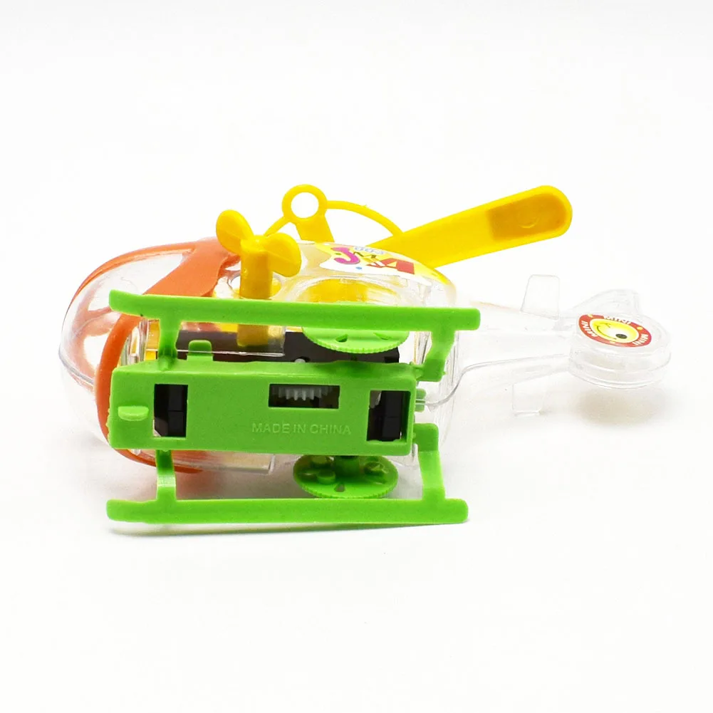 1PCS Novelty Creative Clockwork Helicopter Toy Transparent Mini Airplane Children's Educational Fun Toy Color Random