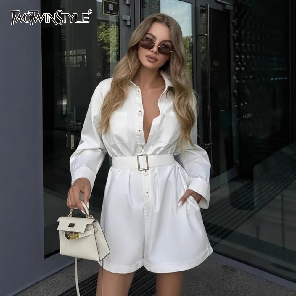 TWOTWINSTYLE Solid Spliced Belt Jumpsuits for Women Lapel Long Sleeve High Waist Minimalist Jumpsuits Female Fashion Style New