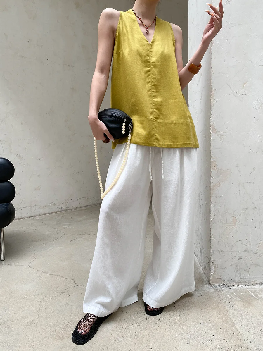 Sommerliche Damen-Weste in unifarbenem Design mit V-Ausschnitt und lockerem Schnitt ohne Ärmel. – Detail 7