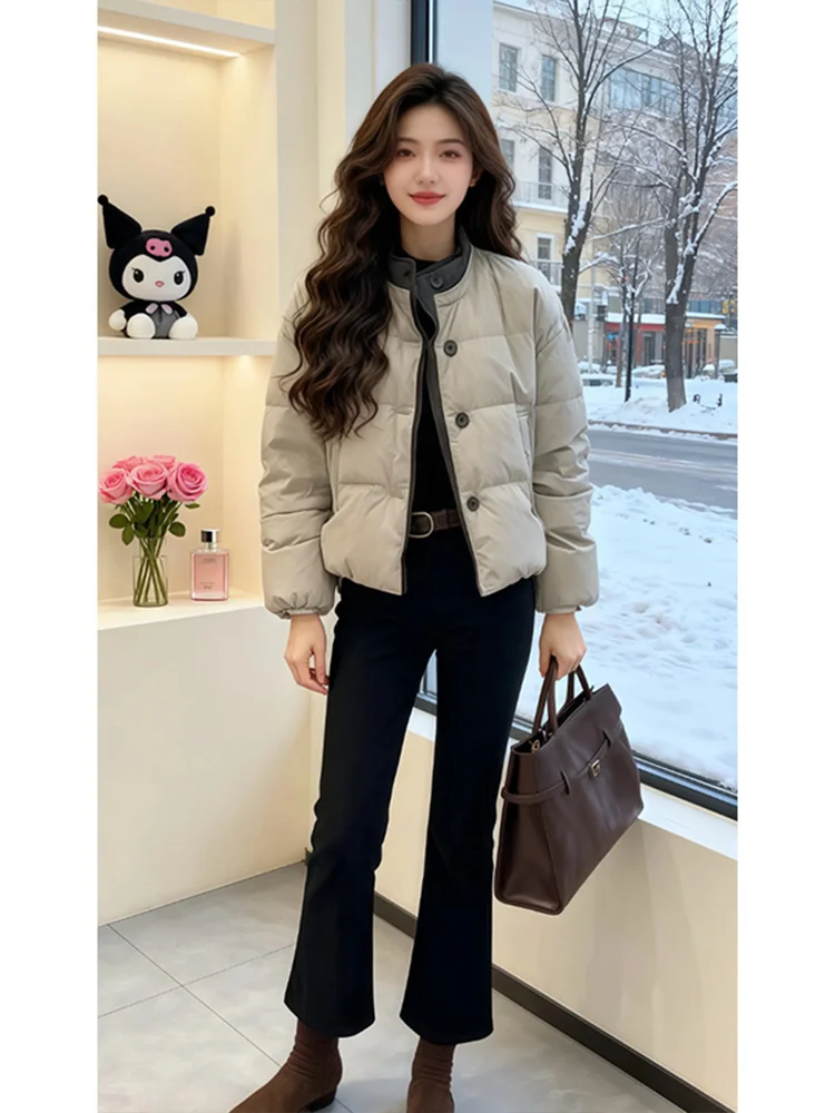 

Корейский дизайн, укороченная куртка-пуховик для женщин, свободная теплая хлопковая куртка с воротником-стойкой, зимняя верхняя одежда, модная, стройнящая.