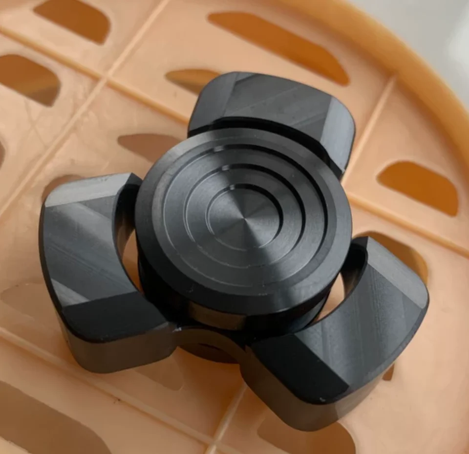 

Used EDC Modergo zirconium alloy three leaf fidget spinner metal decompression toy