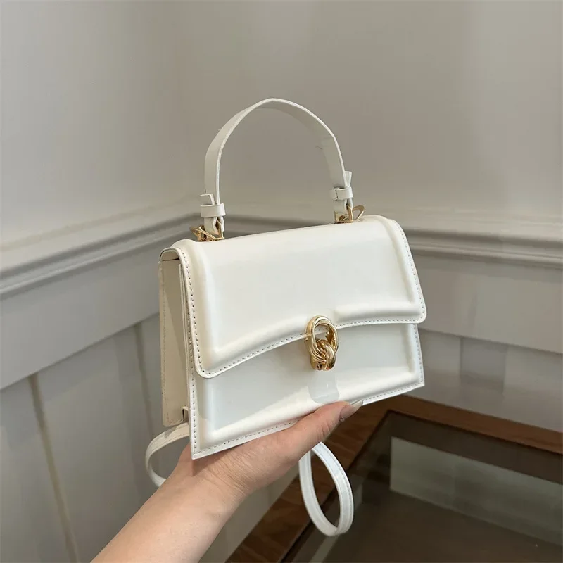 Hand carry small bag women's new handbag foreign style commuting simple messenger small square bag