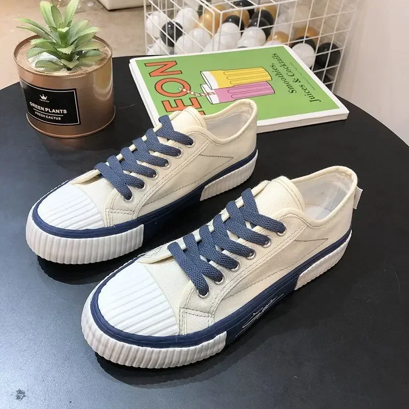 Vendita calda coppia tela piatta da uomo vulcanizzata primavera estate moda Unisex scarpe Casual Sneakers