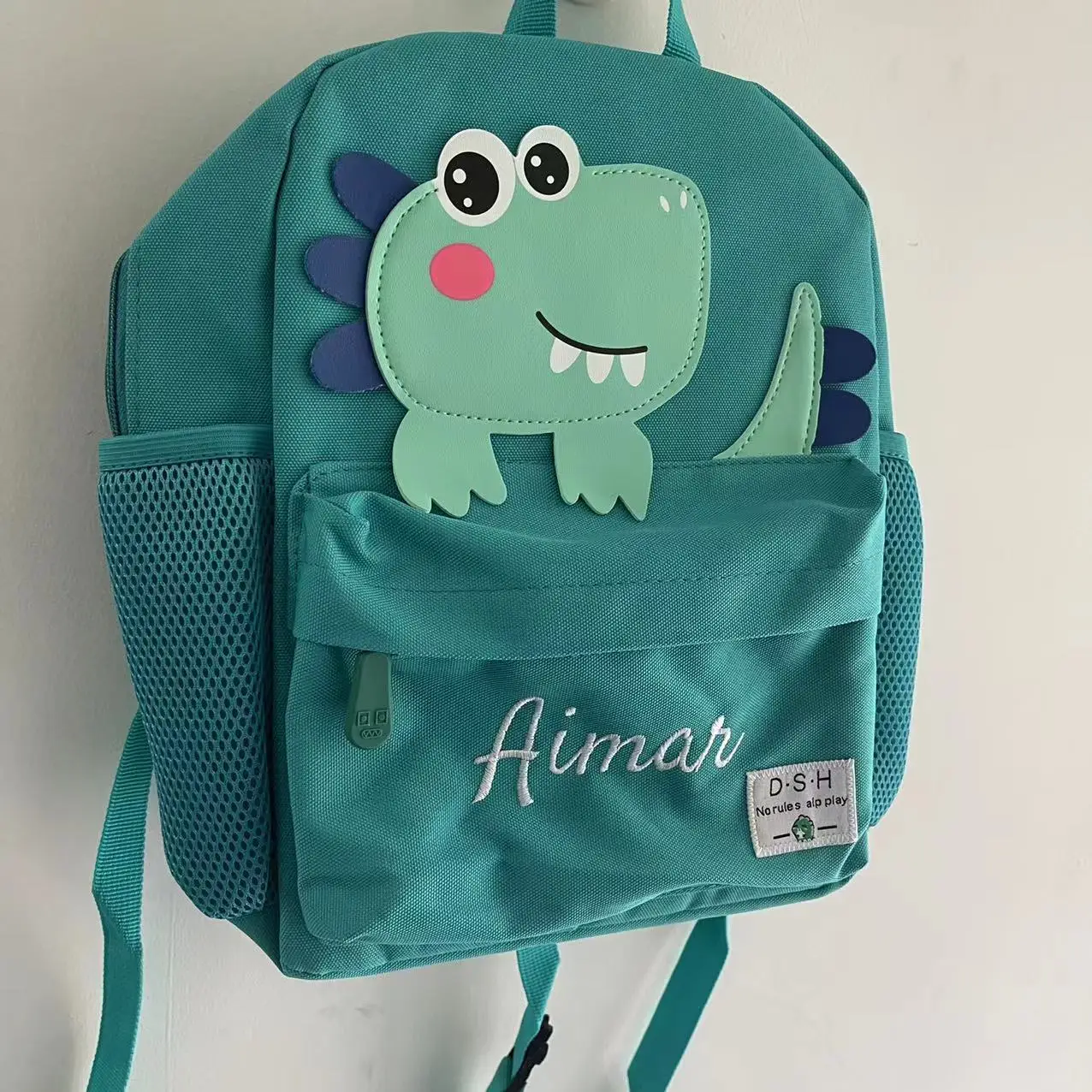 Cute Dinosaur Cartoon Bookbag para crianças, nome personalizado, Kindergarten Boys and Girls Backpack, 3-8 anos de idade, com nome bordado