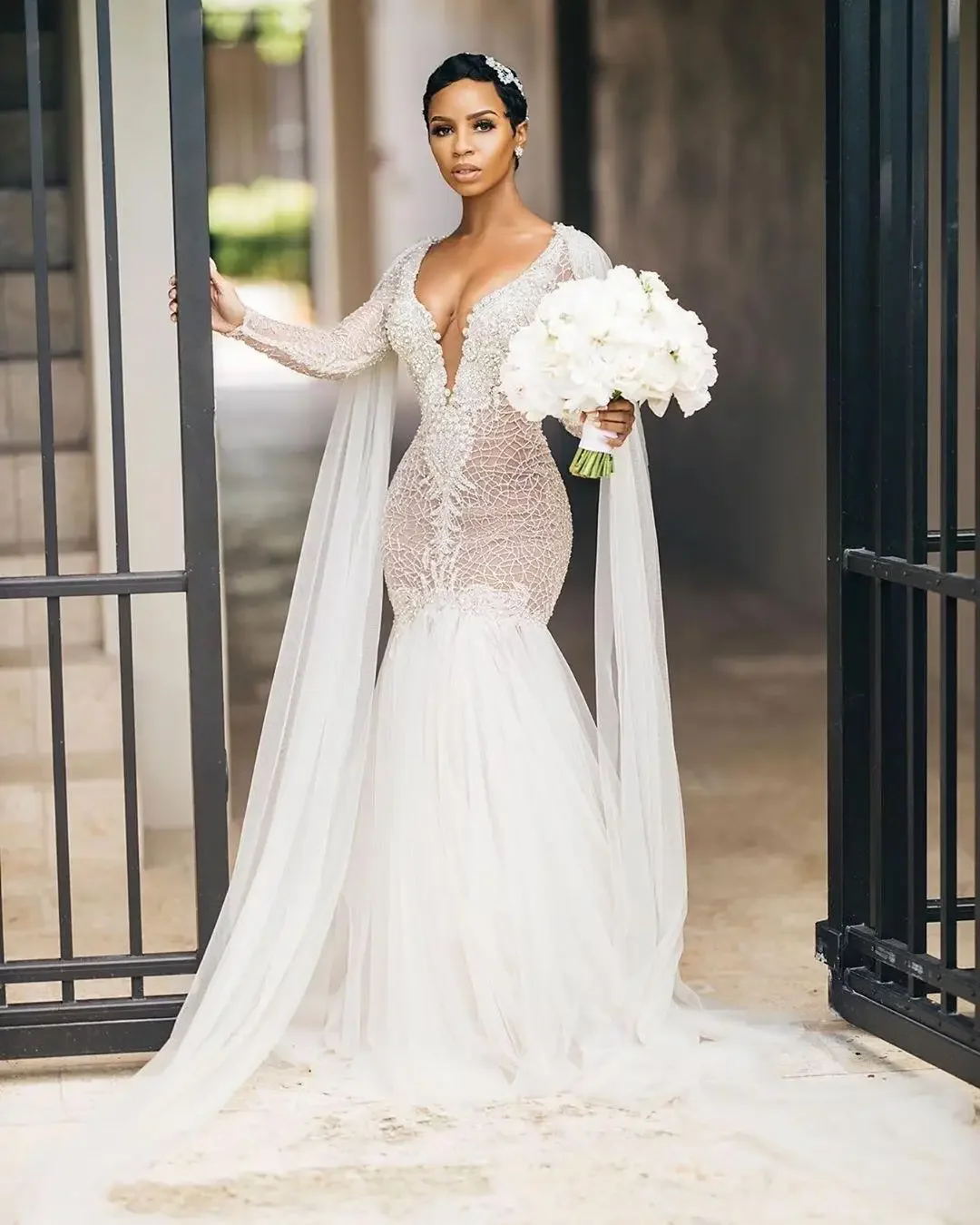 

Customized Sexy Deep V Neck Beaded Mermaid African Wedding Dresses With Fly Way Tulle Sweep Train Robe De Mariée