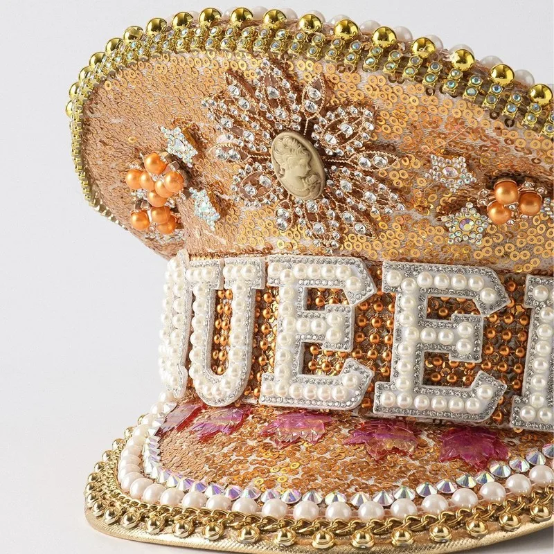 European American style party hat with rhinestones, pearls, sequins, featuring a large brim, the letter 