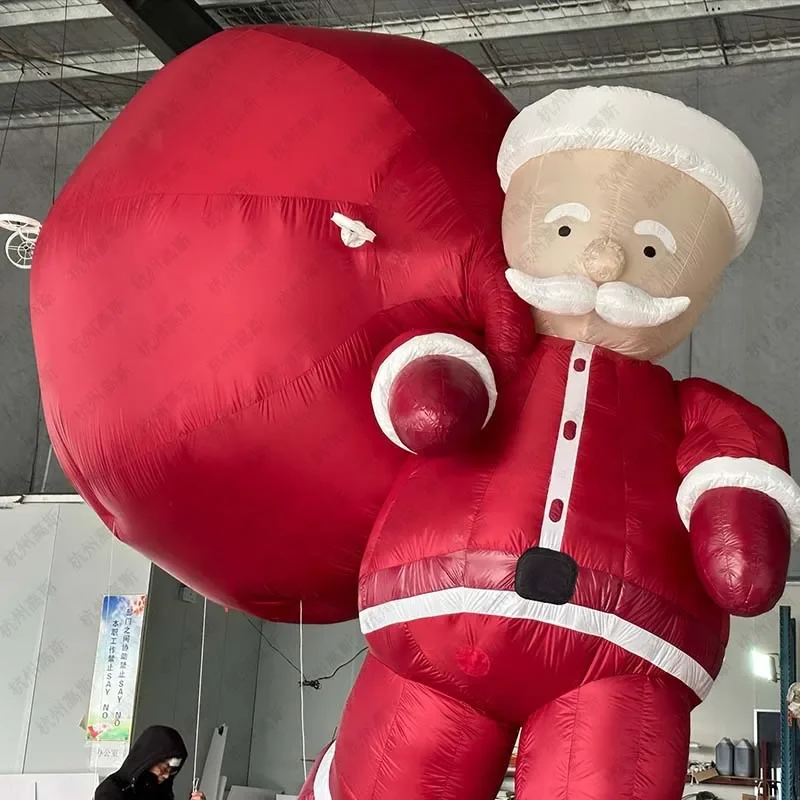 Customized large remote control flying inflatable Santa Claus, Christmas cartoon air model, shopping mall activities aerial