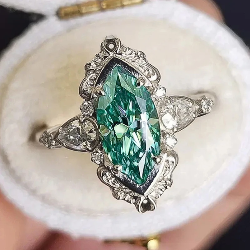 Huitan Marquise-Ringe mit grünem Zirkonia für Damen, neue trendige Eheringe, Accessoires, temperamentvoller, eleganter Damenschmuck für Partys