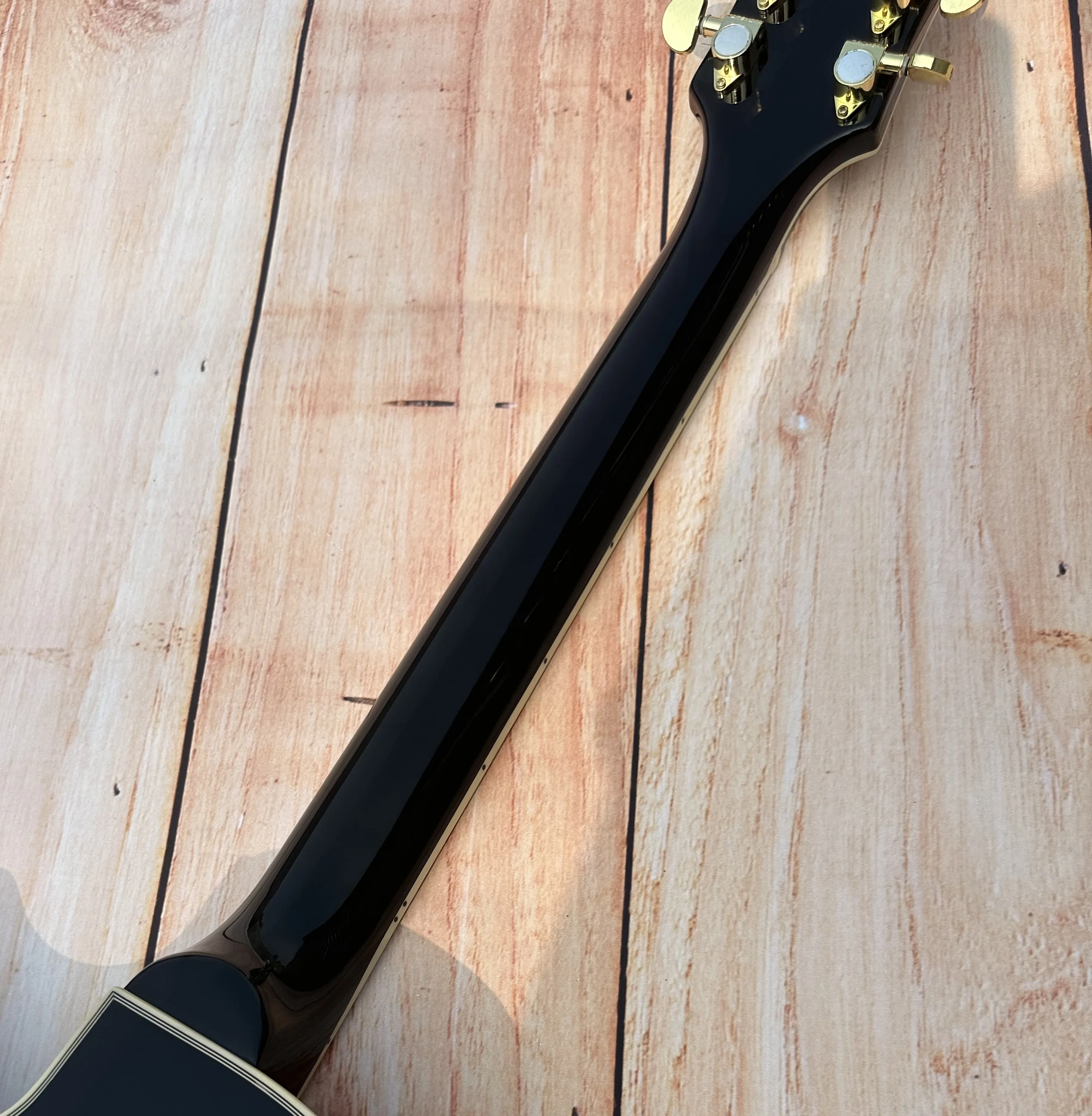 Customized electric guitar, black caston, Imported wood,gold accessories, lightning package