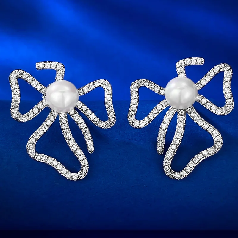 

2023 Flower shaped bow shaped earrings with 925 silver inlaid natural pearls 6mm European and American female earrings