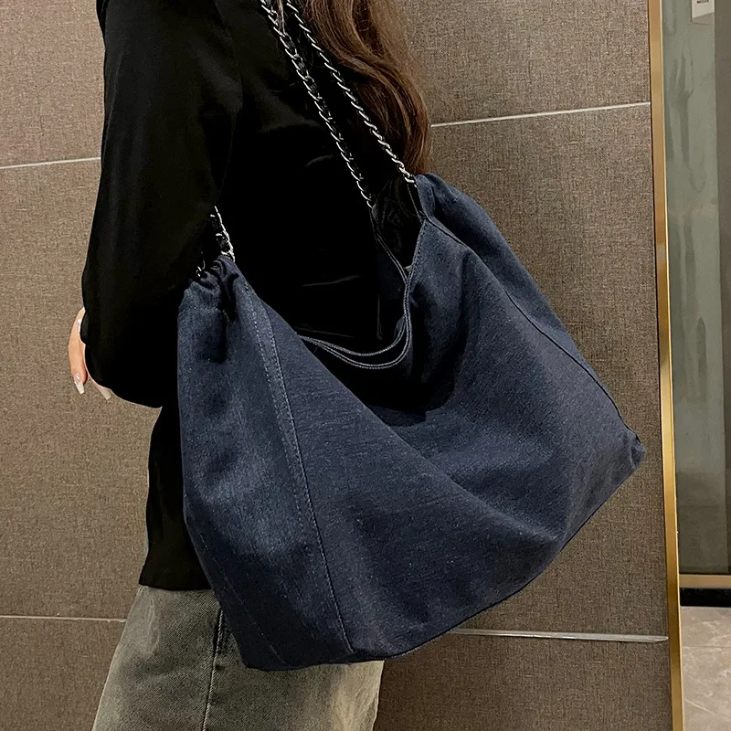 Picture 3: Denim durable women's single-shoulder bag, large-capacity drawstring drawstring opening commuter travel crossbody bag