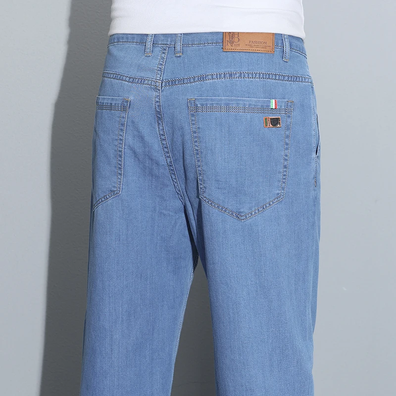 

2026 Spring Summer New Ice Silk Thin Denim Jeans For Men Blue Straight Stretch Cotton Pants Business Casual Lightweight Trousers