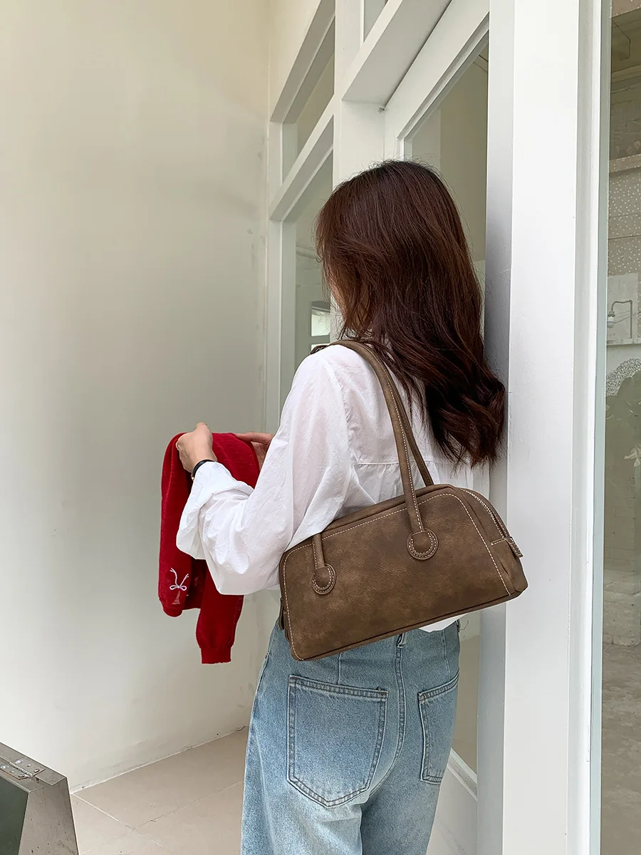 Versión coreana del bolso de otoño para mujer, bolso de hombro para ir al trabajo minoritario, bolso grande para todo en las axilas