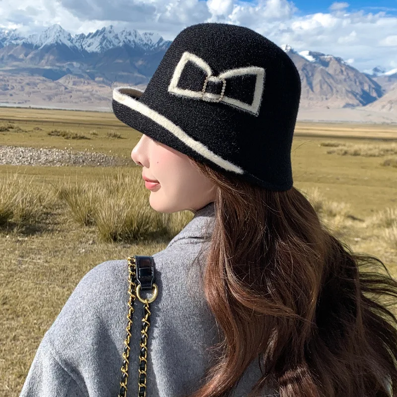 Autumn and Winter Hat Women's 2024 New Wool Hats Show A Small Face and Keep Warm Knitted Hats Ear Protectors Bow Baotou Hats