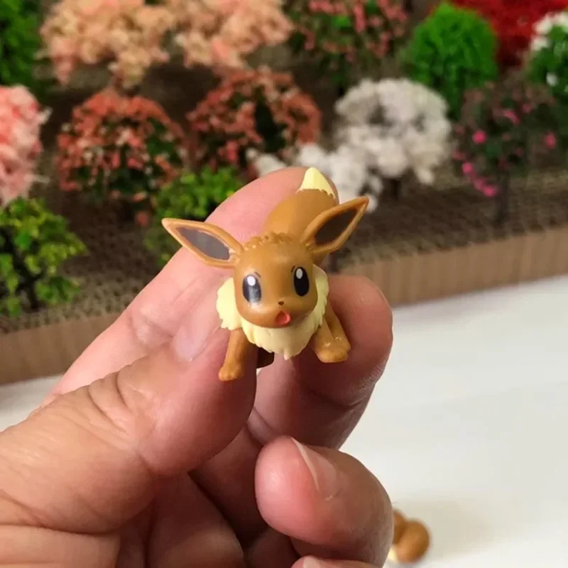 Mini muñecas en miniatura de Pokémon Eevee, modelos de juguetes de colección de ornamentos, combate posturas, sittings, Sleepes