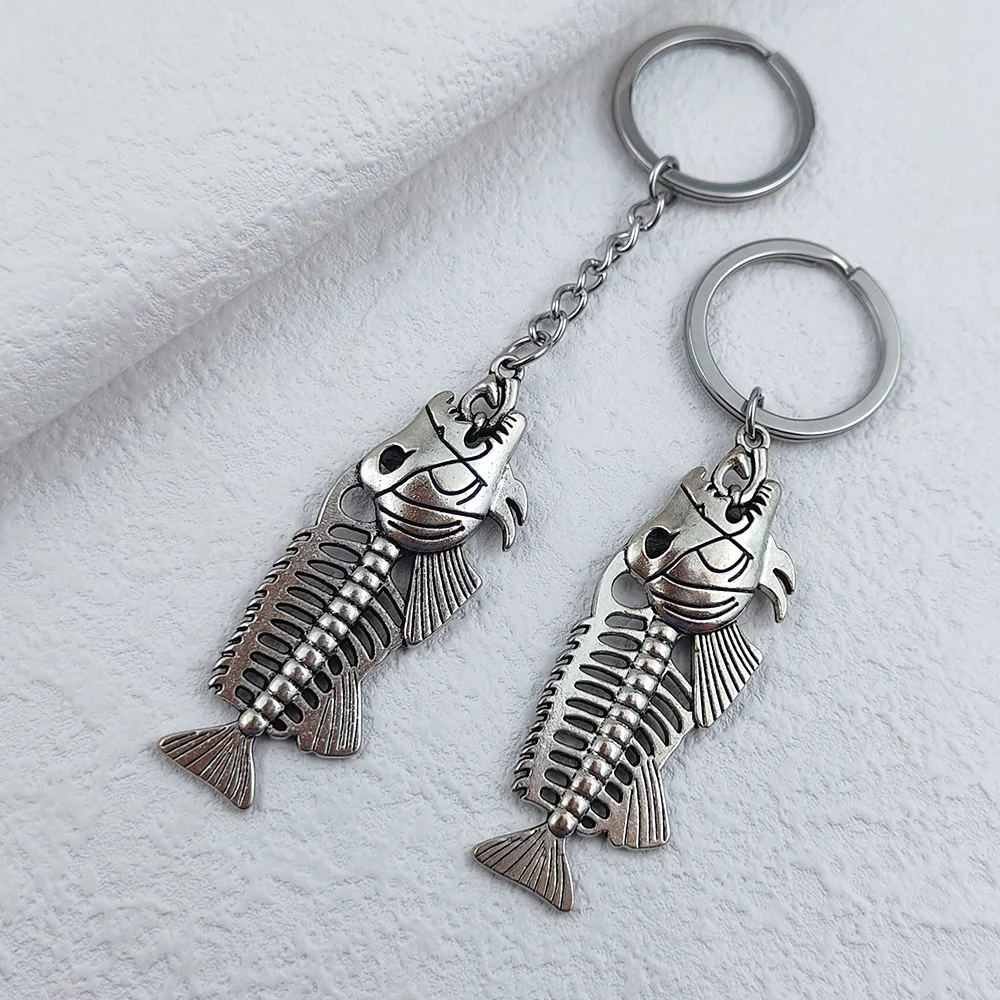 New Women‘s Luxury Alloy Keychain Hollow Out Fishbone Pattern Long Pendant Key Chain for Men Women Car Keyring Gifts Wholesale image 5