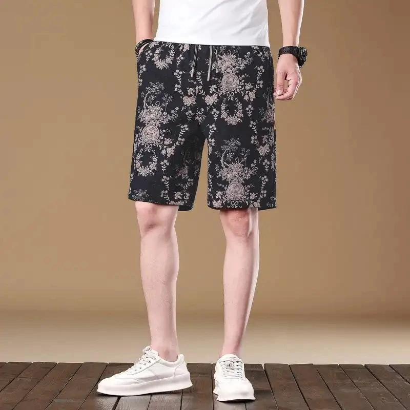 Casual summer floral shorts for men, loose fit with drawstring, simple American retro-style beach pants.