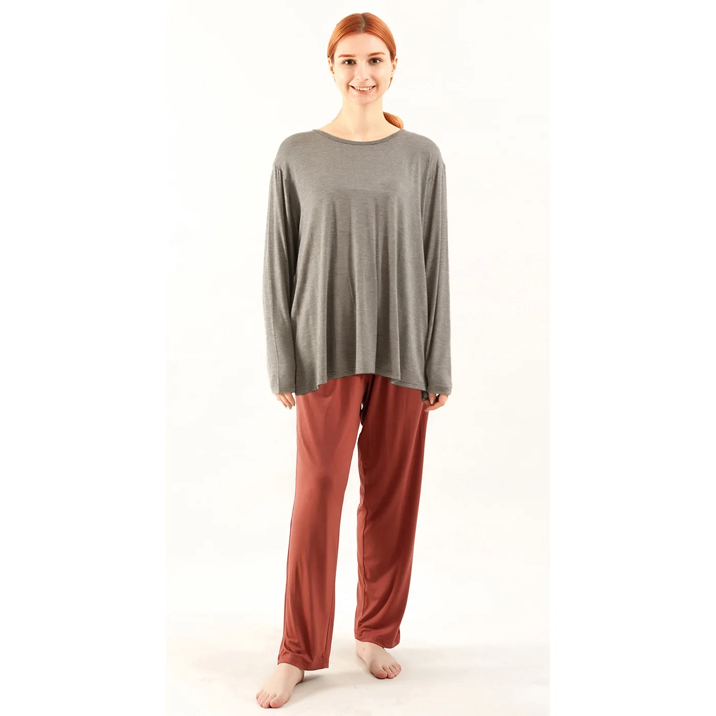$dark gray top + cinnabar red pants