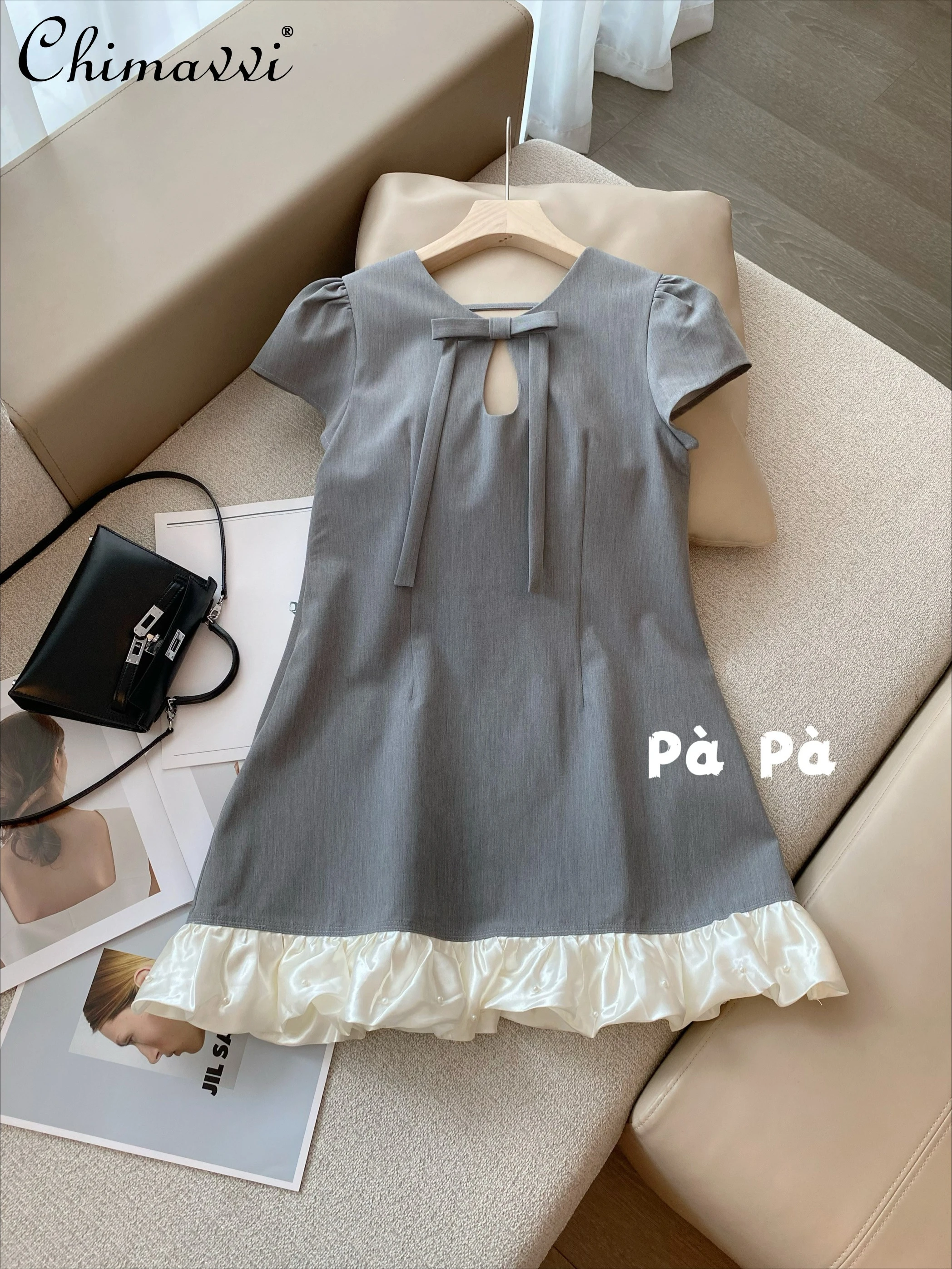 

High-end Fashion Bow Hollow Temperament Suit Dress 2025 Summer New Gray Short-sleeved Splicing Cloud Hem Women's Short Dress