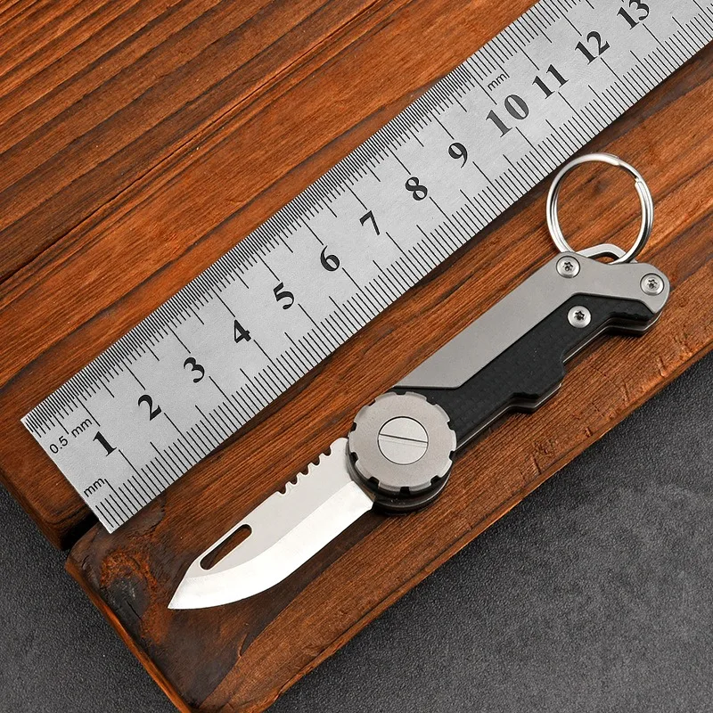 Titanium alloy folding knife EDC multifunctional keychain portable express unpacking sharp mini knife fruit knife