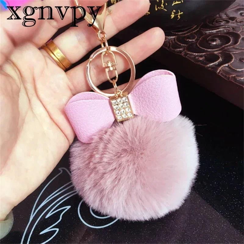 xgnvpy Korean version of the new fashion solid color imitation otter rabbit bow hairball keychain creative gift bag pendant