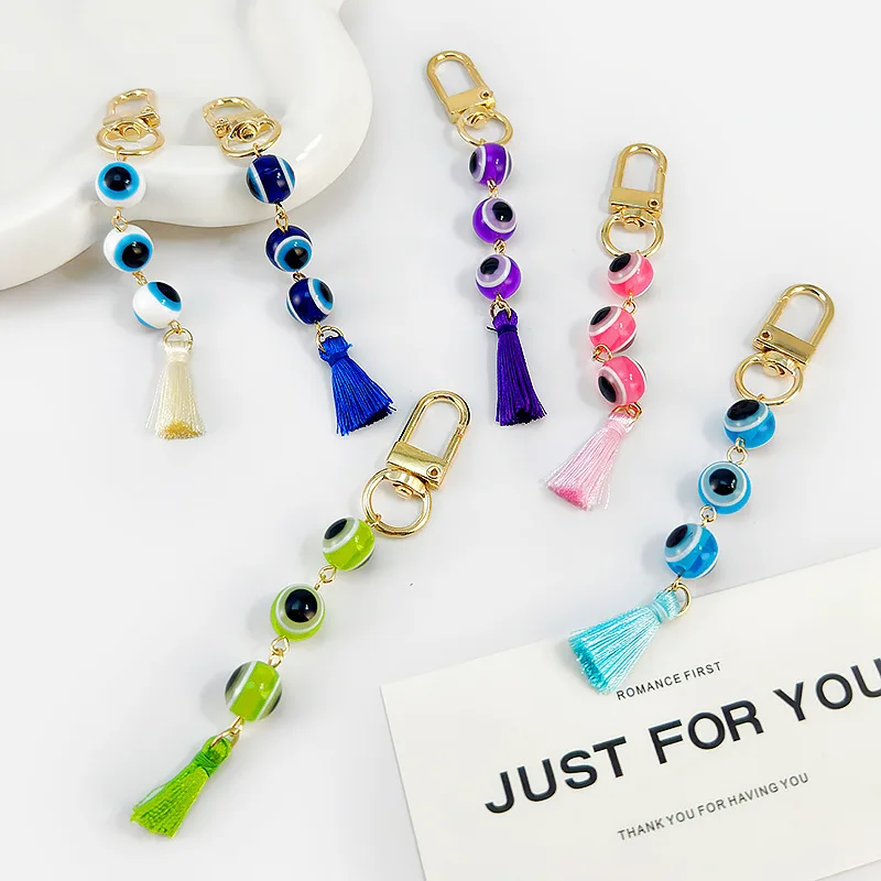 Porte-clés Œil Turc 2026, Porte-clés de protection Œil bleu, Porte-clés Œil turc porte-bonheur avec pompon, Breloque Nazar turque, Cadeau bohème 1 pièce