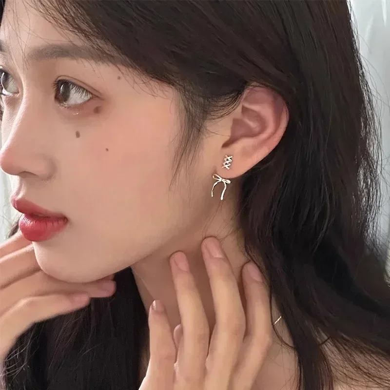 Fashion Silver Color Bowknot Stud Earrings for Women Exquisite Sweet Metal Hollow Line Earrings Jewelry Accessories Party