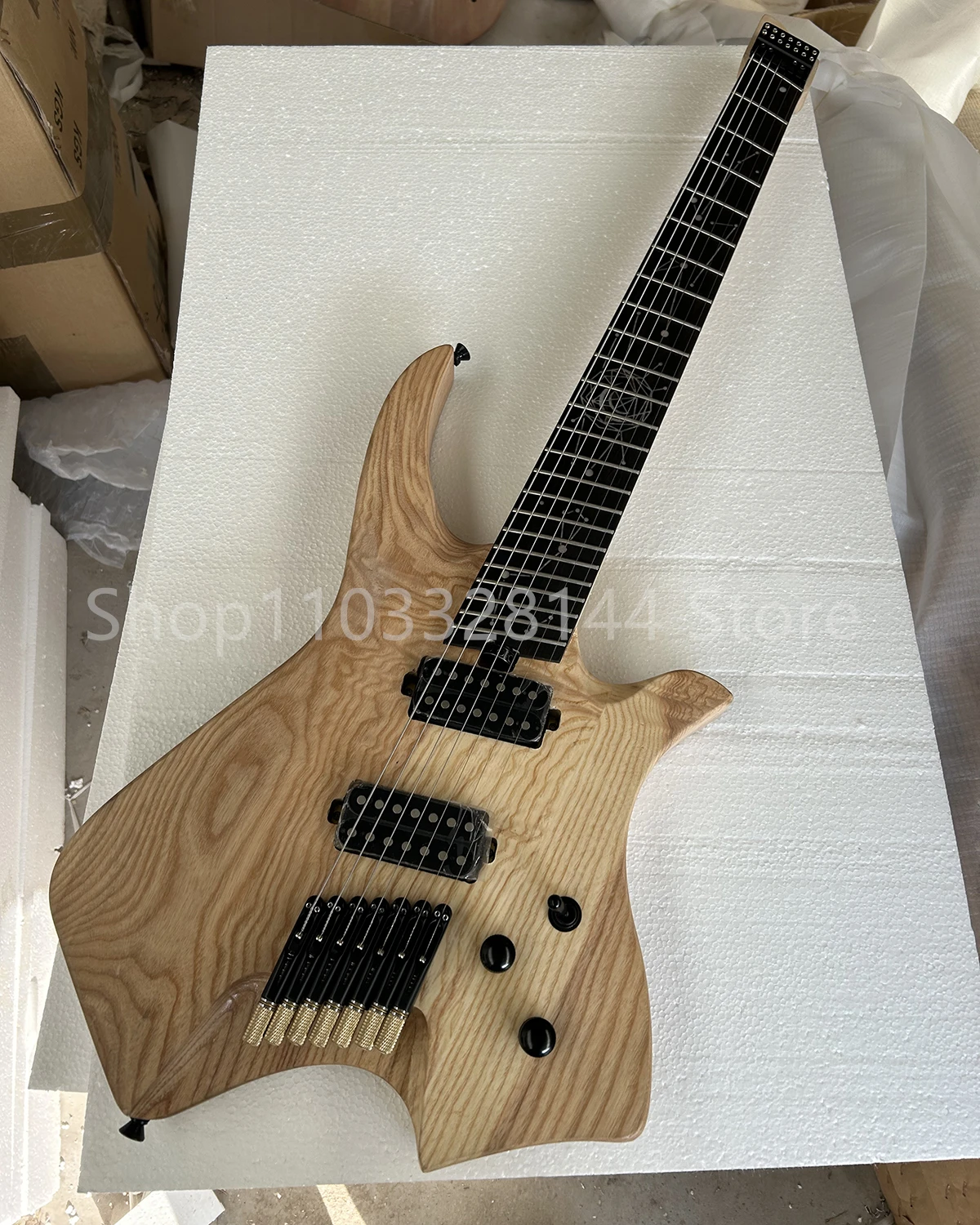 Factory Natural wood No Paint Headless 7 Strings Electric Guitar Ebony Fretboard Ash Body Maple Neck Customizable