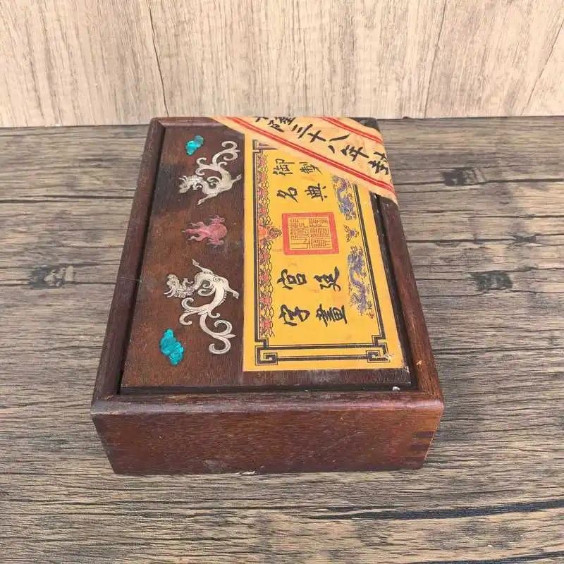 A set of blind- calligraphy and masterpieces including a wooden box containing a scroll painting with a thousand