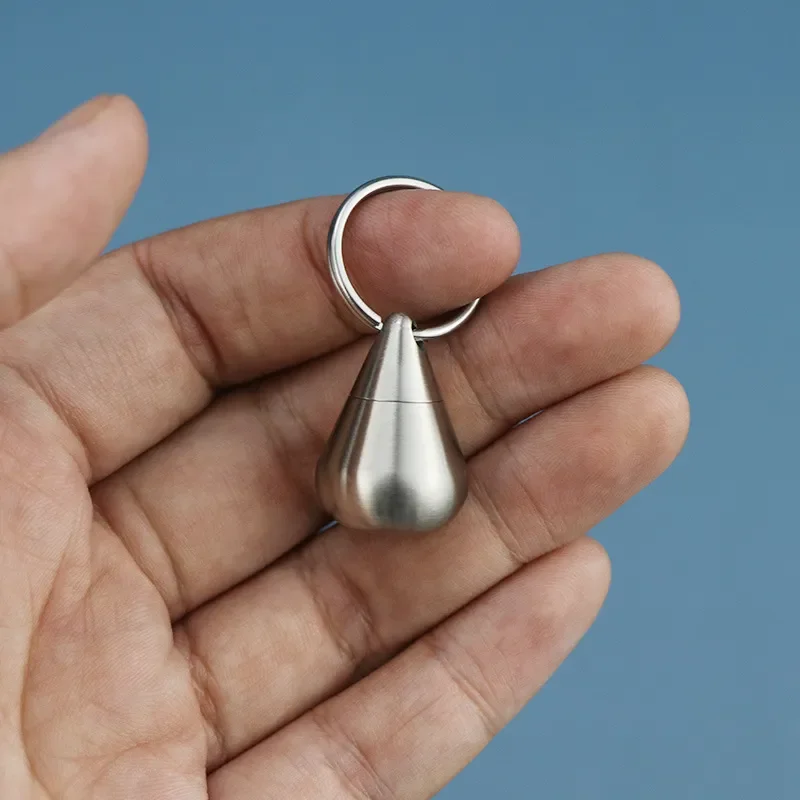 Portapillole portatile mini capsule sigillate in acciaio inossidabile Portapillole impermeabile con ciondolo Portapillole da viaggio per esterni