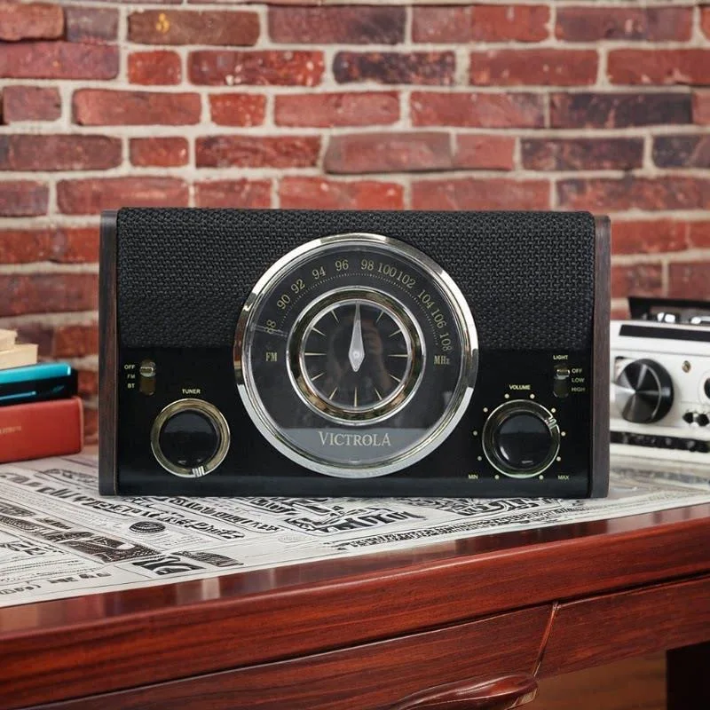 

Classic-style wooden radio with built-in Bluetooth speaker, supports FM reception and wireless streaming, perfect for home