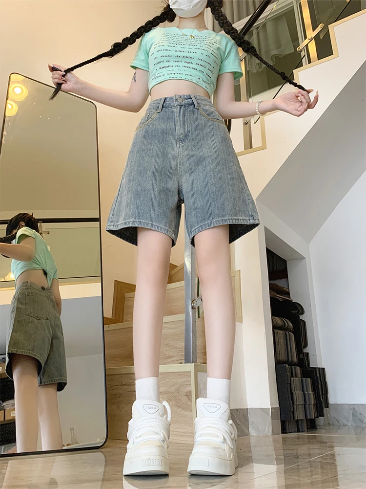 กางเกงยีนส์ขาตรงทรงหลวมเอวสูงลายทางสีอ่อนสไตล์วินเทจสำหรับผู้หญิงใส่หน้าร้อน