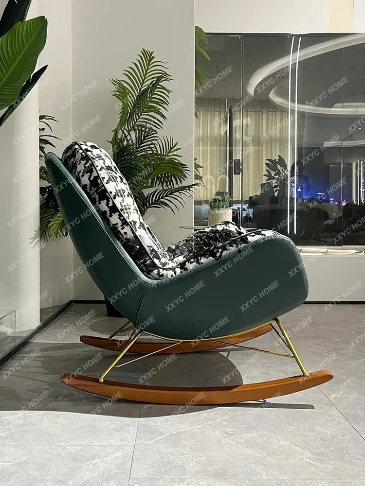 A Nordic light luxury home sofa lazy recliner modern simple thousand bird grid leisure rocking chair