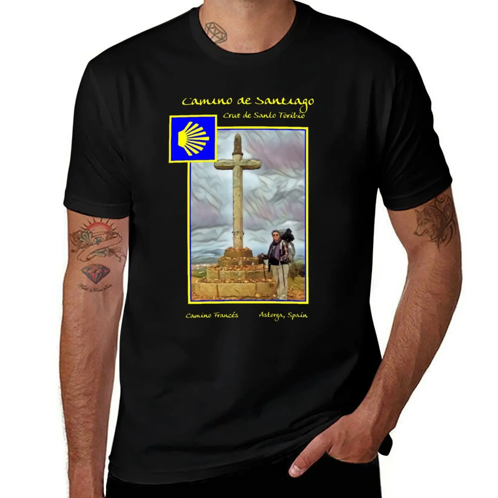 

Camino Francés - Peregrina at the Cruz de Santo Toribio T-Shirt men t shirt cotton 100% t shirt for man T-Shirt